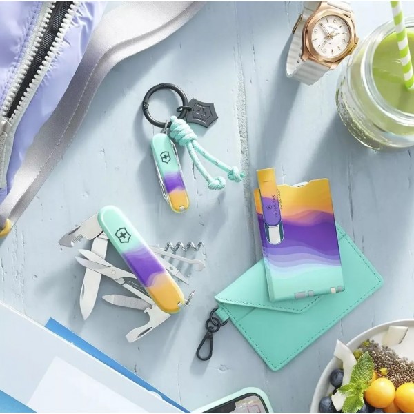 Складаний ніж-брелок 58 мм Victorinox Classic SD Sydney Style, 7 функцій, зелений/фіолетовий/жовтий (0.6223.E222)