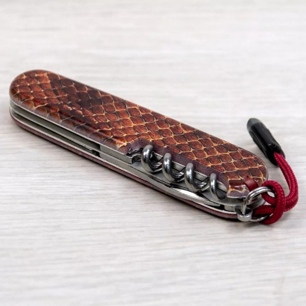 Складаний ніж 91мм Victorinox SPARTAN DESIGN 2 шари, 13 функцій Принт Шкіра кобри (1.3603_R2210pk)