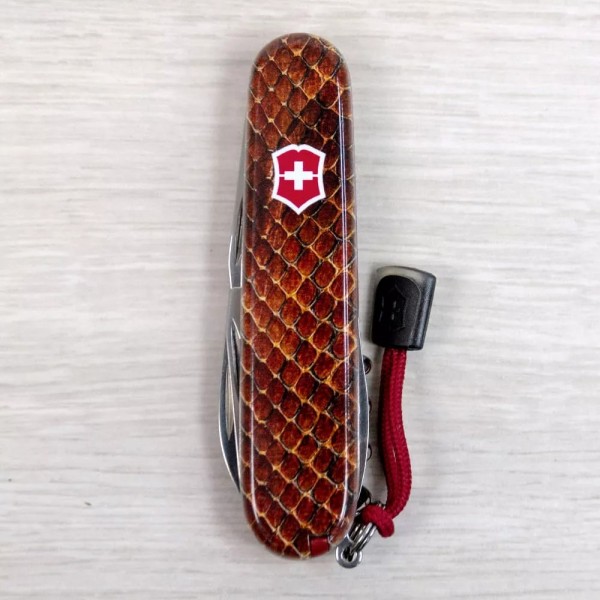 Складаний ніж 91мм Victorinox SPARTAN DESIGN 2 шари, 13 функцій Принт Шкіра кобри (1.3603_R2210pk)