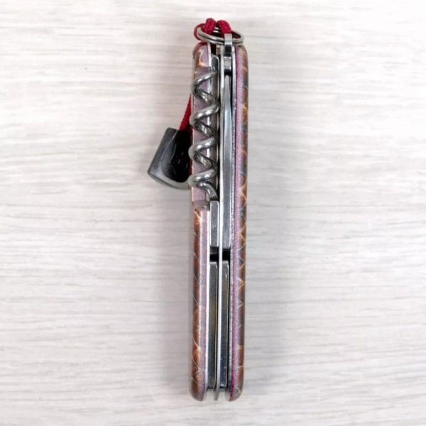 Складаний ніж 91мм Victorinox SPARTAN DESIGN 2 шари, 13 функцій Принт Шкіра кобри (1.3603_R2210pk)