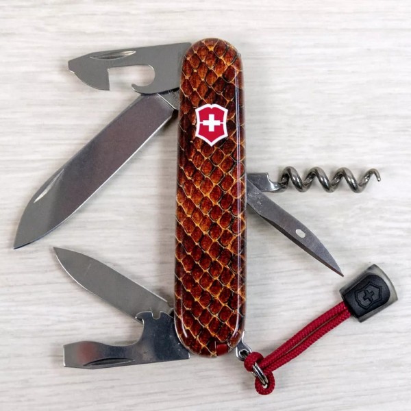 Складаний ніж 91мм Victorinox SPARTAN DESIGN 2 шари, 13 функцій Принт Шкіра кобри (1.3603_R2210pk)