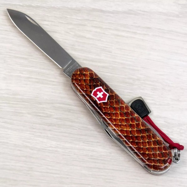 Складаний ніж 91мм Victorinox SPARTAN DESIGN 2 шари, 13 функцій Принт Шкіра кобри (1.3603_R2210pk)